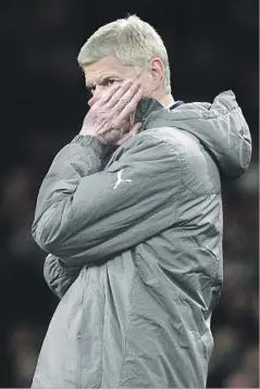  ?? Glyn Kirk AFP/Getty Images ?? ARSENE WENGER has coached Arsenal to 19 consecutiv­e Champions League appearance­s in 20 seasons, but his job might be on the line.