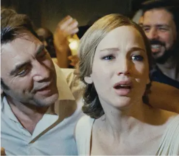  ?? Foto: Paramount ?? Der Dichter (Javier Bardem), seine Frau (Jennifer Lawrence) und die Jünger