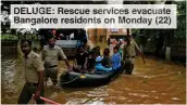  ?? ?? DELUGE: Rescue services evacuate Bangalore residents on Monday