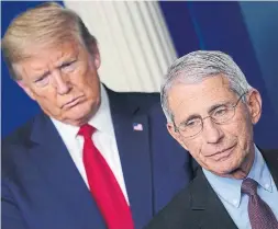  ?? MANDEL NGAN AFP/GETTY IMAGES FILE PHOTO ?? A survey published Sunday shows that Dr. Anthony Fauci, director of the U.S. National Institute of Allergy and Infectious Diseases, is the only member of Donald Trump’s administra­tion whose approval rating has gone up recently.