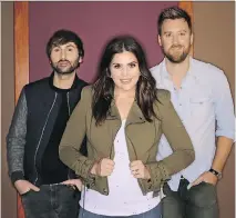  ?? MARK HUMPHREY/THE ASSOCIATED PRESS ?? The members of Lady Antebellum include Dave Haywood, left, Hillary Scott, and Charles Kelley.