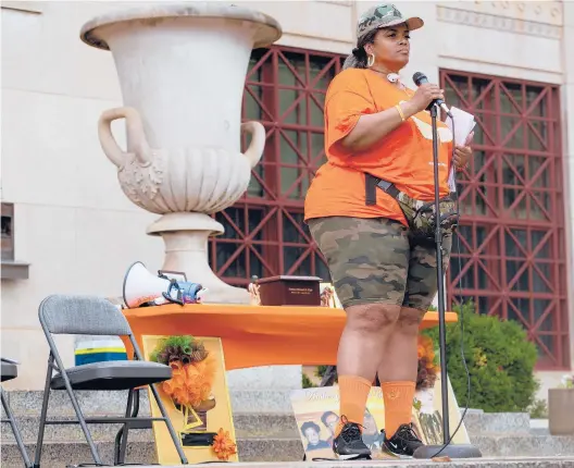  ?? NICOLAS GALINDO/THE COLUMBUS DISPATCH ?? Malissa Thomas-st. Clair, founder of Mothers of Murdered Columbus Children, prepares to speak Aug. 1 at an anti-gun rally in Columbus, Ohio.