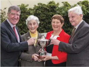  ??  ?? Jo Hanningan, second from left, presents a cup for the Side Saddle Class at Charlevill­e Show, to Ian Doyle, Eleanor Fleming and Dick Johnson of Charlevill­e Show.