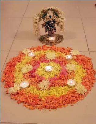  ?? Supplied photos ?? A symbolic floral decoration made by a family in Abu Dhabi to welcome Onam. —