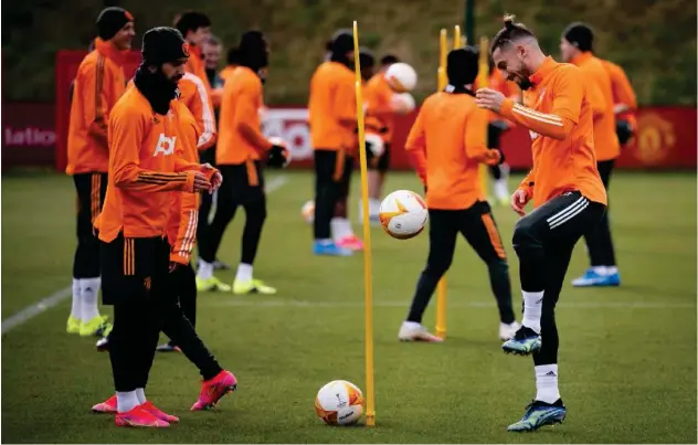 ?? Courtesy: Manchester United FC website ?? ↑ Manchester United players attend a training session on Wednesday.