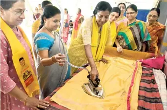  ?? G.N. RAO ?? Going to great lengths: Gadde Anuradha, wife of TDP Vijayawada East candidate Gadde Rammohan Rao, campaignin­g for her husband in Vijayawada.