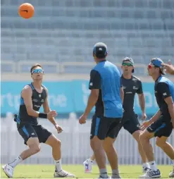  ??  ?? RANCHI: New Zealand’s Trent Boult (L) play a warm up game with his teammates at a practice session ahead of the fourth One Day Internatio­nal (ODI) cricket match at the Jharkhand State Cricket Associatio­n (JSCA) stadium in Ranchi yesterday. —AFP