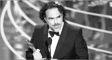  ??  ?? Inarritu wins the Best Directing Oscar award for ‘The Revenant’ in 2016. — File photo