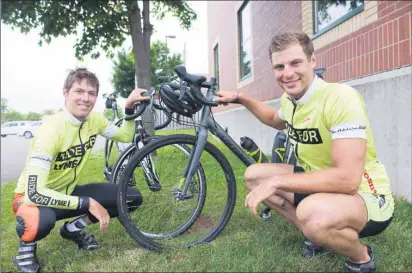  ?? BRIAN MCINNIS/THE GUARDIAN ?? Tanner Cookson, left and Daniel Corso, have been cycling across Canada to draw attention to the dangers of Lyme disease. They made a stop in Charlottet­own recently on their way to St. John’s, N.L., and the end of their journey that began in Victoria,...