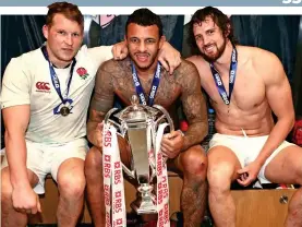  ?? DAVID ROGERS ?? Bitter-sweet: (from left) Dylan Hartley, Courtney Lawes and Tom Wood with the Six Nations trophy in the Aviva Stadium