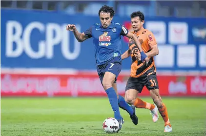  ??  ?? BG Pathum United striker Diogo Luis Santo, left, in action during a recent Thai League 1 match.