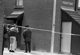  ??  ?? GRISLY END FOR BRITISH SPY: Alfredo “Freddie” Scappaticc­i (extreme left of picture/side-faced) aka Stakeknife pictured at the 1988 funeral of IRA man Brendan Davidson. Gerry Adams is pictured carrying the coffin of Davidson who was shot dead by what...