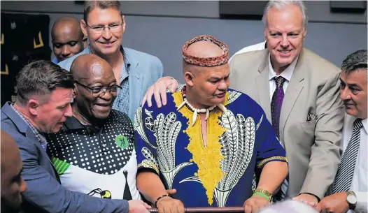  ?? Photo: Emacous Simphiwe Moyo ?? Former president Jacob Zuma (left) and his benefactor Louis Liebenberg (second from right) with supporters at the Afrikaners Leaders Forum, which was held at The Maslow Time Square in Pretoria on 16 March.