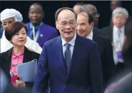  ?? WANG ZHUANGFEI / CHINA DAILY ?? Vice-President Wang Qishan attends the Third Forum on China-Africa Local Government Cooperatio­n in Beijing on Tuesday. About 400 people were attracted to the forum.