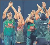  ?? AFP ?? Bangladesh players did a nagin dance after beating Sri Lanka to enter the Nidahas Trophy final in Colombo.