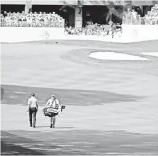  ?? AARON DOSTER, USA TODAY SPORTS ?? Jimmy Walker, left, shot 3-over-par 73 Thursday and was one of the 56 players who didn’t break par on the tough course.