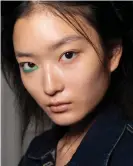  ?? Photograph: Matteo Valle/Imaxtree.com ?? Keeping an eye on things: green colour at Jamie Wei Huang’s SS20 show.