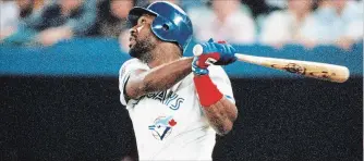  ?? GETTY IMAGES FILE PHOTO ?? Blue Jays’ Joe Carter bats against the Philadelph­ia Phillies during Game 6 of the 1993 World Series.