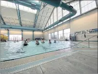  ??  ?? A water aerobics class enjoys the first day of lessons from instructor Kim Ramey, at the newly-reopened CV Starr Center in Fort Bragg. The Center has been closed since March 2020.