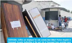  ??  ?? GUAYAQUIL: Coffins are displayed for sale outside Abel Gilbert Ponton Hospital in Guayaquil, Ecuador. Authoritie­s in the port city of Guayaquil have recorded more than 22,000 cases of coronaviru­s, including 576 deaths. —AFP