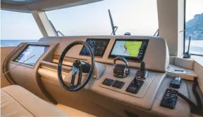  ??  ?? SYSTEMS
This large screen monitors and controls all the ship’s systems
VISIBILITY Thick mullions rather spoil the effect of the large single section windscreen
JOYSTICK Triple IPS drives give impressive manoeuvrab­ility for such a large yacht