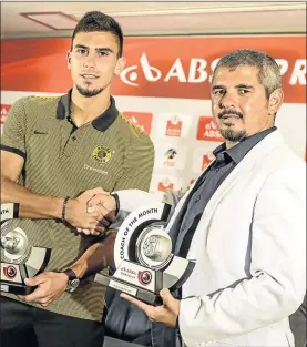  ?? PHOTO: SYDNEY SESHIBEDI/GALLO IMAGES ?? Lorenzo Gordinho was yesterday named the Absa Premiershi­p Player of the Month for August/September, while Clinton Larsen of Golden Arrows ws voted the best coach.