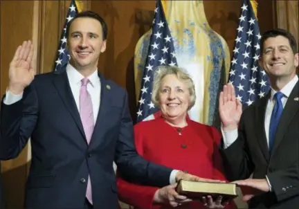  ?? ASSOCIATED PRESS FILE PHOTO ?? In this Jan. 3, 2017 file photo, House Speaker Paul Ryan administer­s the House oath of office to U.S. Rep. Ryan Costello, R-6th Dist., during a mock swearing in ceremony on Capitol Hill in Washington. Both Costello and Ryan announced earlier this year...