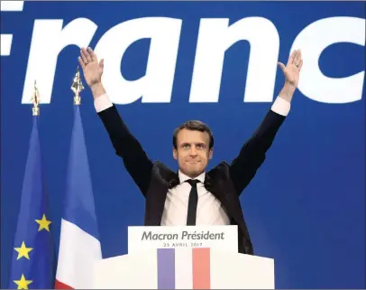  ?? PHOTO: AP ?? Emmanuel Macron, France’s independen­t presidenti­al candidate, who supports keeping France in the eurozone, came in first in the presidenti­al vote with 23.9 percent, ahead of anti-euro, anti-EU nationalis­t Marine Le Pen, who got 21.4 percent