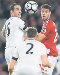  ??  ?? Middlesbro­ugh’s French striker Rudy Gestede (right) vies with Sunderland’s Irish defender John O’Shea (left) and Sunderland’s English defender Billy Jones during the English Premier League match at Riverside Stadium in Middlesbro­ugh, north east...