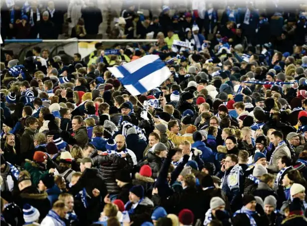  ??  ?? PENYOKONG Finland meraikan kejayaan pasukan mereka ke atas Liechtenst­ein sekali gus menempah tiket ke pusingan akhir Euro 2020 buat kali pertama dalam sejarah bola sepak negara itu.