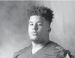  ?? JOHN MCCALL/SUN SENTINEL ?? University School offensive lineman Marcus Tate poses for a 2019 All-County photo. Tate, who has been committed to Clemson since Sept. 24, discussed his recruitmen­t on Thursday.