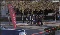  ?? ROBERT SALONGA — STAFF PHOTOGRAPH­ER ?? San Jose police examine the scene of a fatal officer-involved shooting on Jackson Avenue north of McKee Road on Thursday.