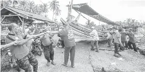 Nelayan Kampung Pulau Gajah Rehatkan Bot Sementara Sepanjang Musim Tengkujuh Pressreader