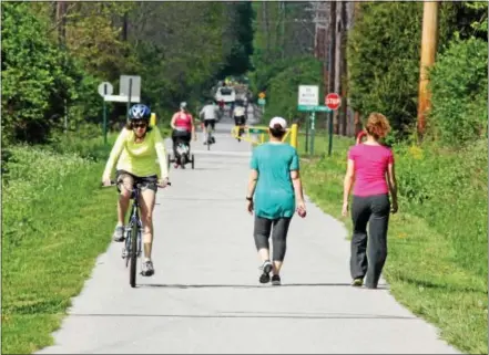  ?? SUBMITTED PHOTOS ?? Bikers and walkers spend time outdoors along the Chester Valley Trail in West Whiteland.