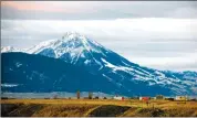  ?? Associated Press photo ?? This Nov. 21, 2016, file photo shows Emigrant Peak towering over the Paradise Valley in Montana north of Yellowston­e National Park, the day U.S. officials announced a ban on new mining claims across more than 30,000 acres in the area.