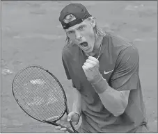  ?? AP PHOTO ?? Denis Shapovalov clenches his fist after scoring a point against John Millman during their first round match at the French Open tennis tournament.