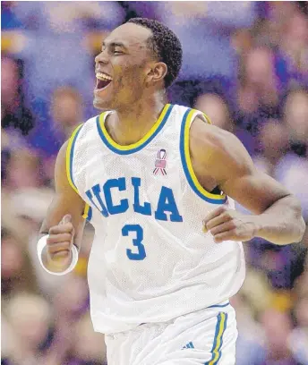  ?? KEVORK DJANSEZIAN/ AP ?? UCLA’s Billy Knight celebrates a three- point basket in a December 2001 game against Georgetown. He averaged 14 points a game as a senior but wasn’t drafted into the NBA.