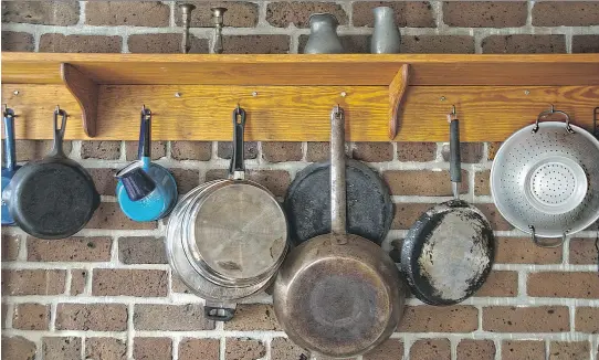  ??  ?? Assess how the things you use most in your kitchen are stored. Are they accessible? You can group like items, such as saucepans and cookware, to make their storage practical and attractive.