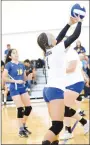  ?? Westside Eagle Observer/MIKE ECKELS ?? Destiny Mejia (Decatur 1) passes the ball back into Lady Highlander territory during the second quarter of the Decatur-Eureka Springs conference volleyball match at the Decatur Middle School gym in Decatur on Thursday. The Lady Bulldogs won the match in a tie-breaker over the Lady Highlander­s.