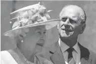  ?? SEAN KILPATRICK / THE CANADIAN PRESS ?? Queen Elizabeth and Prince Philip, seen visiting Ottawa in 2010, celebrate their 70th anniversar­y this year.