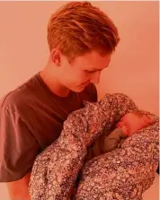  ??  ?? Proud dad: Axelsen with his daughter Vega.