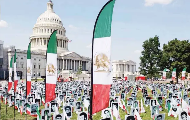  ??  ?? Exhibition commemorat­ing the martyrs of the 1988 Massacre in Washington, DC, in front of Congress.