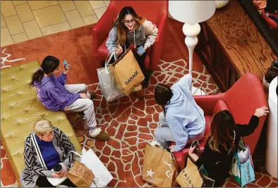  ?? Carol Kaliff / For Hearst Connecticu­t Media ?? The Danbury Fair mall opened its doors to Black Friday shoppers at 7a.m. and in some cases earlier.