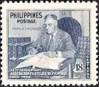  ?? ?? Franklin D. Roosevelt studying one of his many stamp collection­s.