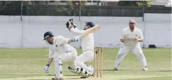  ??  ?? Philadelph­ia wicket-keeper Gary Braithwait­e juggles with the ball against Seaham Park last weekend.