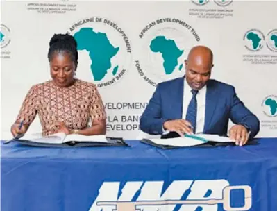  ?? ?? AfDB country manager Moono Mupotola and NMB Bank chief executive officer, Gerald Gore at the signing ceremony