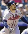  ?? DAVID ZALUBOWSKI/AP ?? Braves catcher Travis d’arnaud (above), who signed a two-year extension last week, will get a chance to team with right-hander Charlie Morton again next season.