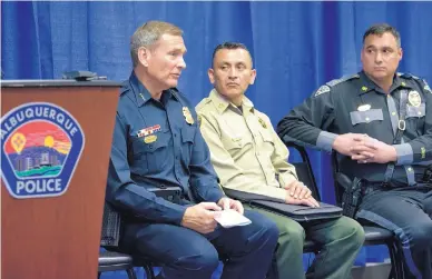 ?? MARLA BROSE/JOURNAL ?? Albuquerqu­e Police Chief Mike Geier, left, explains details about the interagenc­y coordinati­on to tackle auto thefts in Bernalillo County, with Bernalillo County Sheriff Manuel Gonzales, center, and New Mexico State Police Chief Pete Kassetas during a...