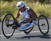  ?? MARK J. TERRILL - THE ASSOCIATED PRESS ?? In this Saturday, Oct. 10, 2015 file photo, Alex Zanardi, of Italy, rides during the cycling portion of the Ironman World Championsh­ip Triathlon, in KailuaKona, Hawaii.