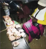  ?? ?? Meat vendors at Chitubu shopping centre in Glen Norah